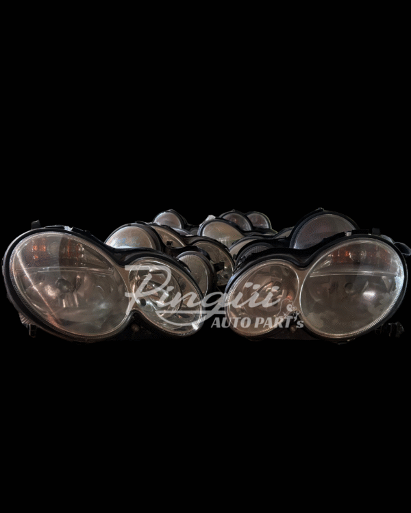 Par de faros delanteros W209 (usados)